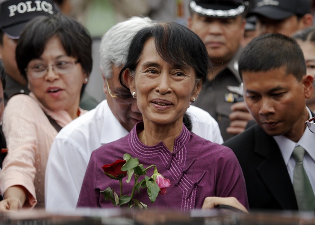 Suu Kyi demands better rights for Burmese migrants