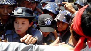 Students and police scuffle at around midday on 3 March 2015. 