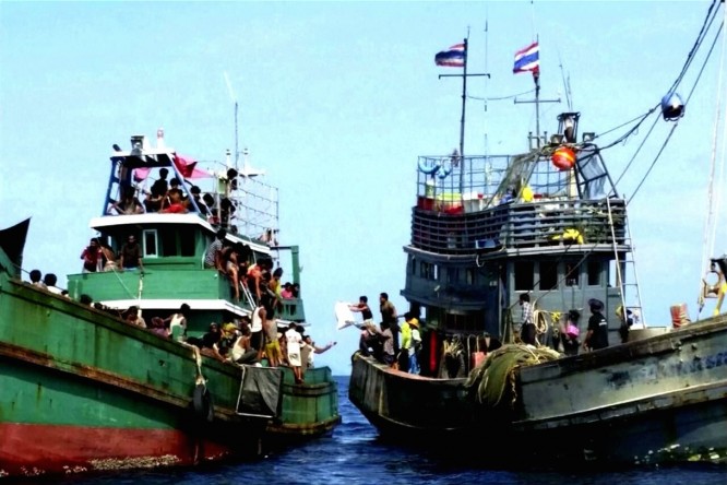 Thai crackdown points people smugglers to Malaysia