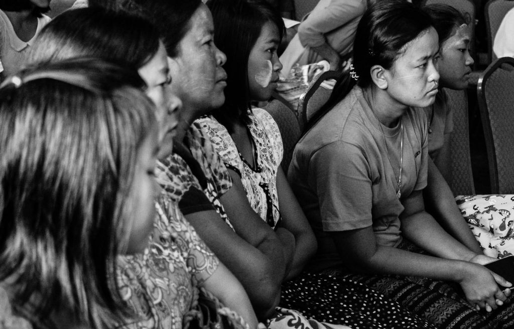 Young women listen to a victim of rape and torture talking at a conference IN Rangoon on the weekend. (Photo: Libby Hogan / DVB)