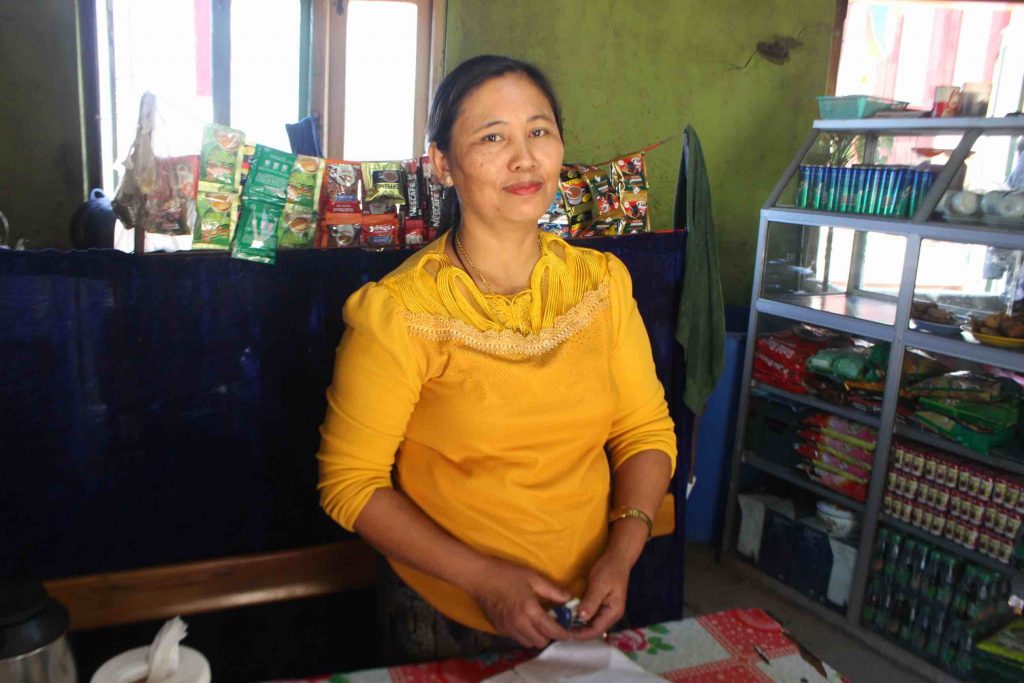 Par Nei Cuai is part of the women's savings group who took a loan to start her own teashop business. (Photo: Libby Hogan/DVB)
