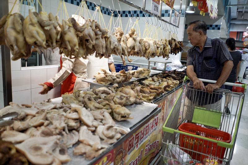 Burmese migrant workers go on trial for accusing Thai chicken farm of abuse