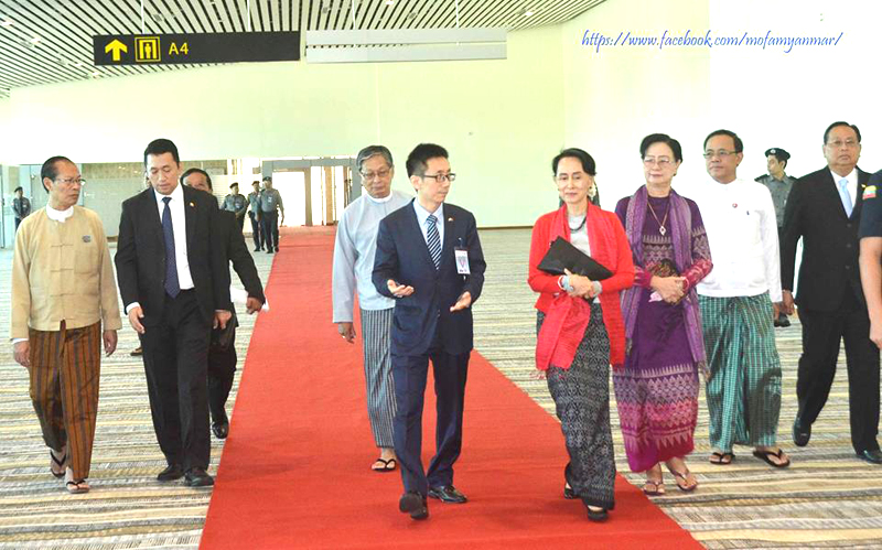 Suu Kyi heads to China conference