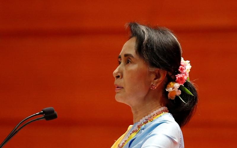 Suu Kyi driven to court, too sick to stand trial: Lawyer