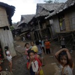 Ethnic Karen refugee children pass the time at the Mae La camp outside Mae Sot