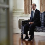 Myanmar’s President Thein Sein sits in waiting room during his visit to Istana in Singapore