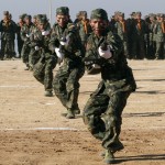 Shan State Army (SSA) soldiers demonstrate their skills during the 65th anniversary of Shan State National Day at the army’s Loi Taileng headquarters in Shan State along the Myanmar-Thai border