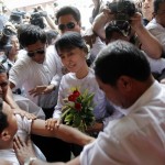 Myanmar’s pro-democracy leader Aung San Suu Kyi arrives the National League for Democracy office in Yangon