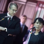 Myanmar pro-democracy leader Aung San Suu Kyi talks to reporters after meeting with Italian Minister for Foreign Affairs Giulio Terzi in Suu Kyi’s home in Yangon