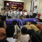 Members of NLD pay their respects to Myanmar’s pro-democracy leader Suu Kyi during ceremony at NLD party head office in Yangon