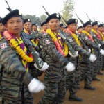 Military personnel from the Democratic Karen Buddhist Army (DKBA), an ethnic militia battling Myanmar’s military junta, take part in a traditional New Year’s parade on the Myanmar-Thai border