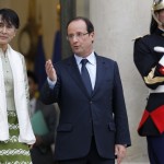 Myanmar pro-democracy leader Suu Kyi leaves after dinner with French President Hollande in Paris