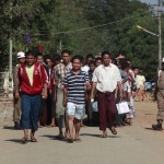 Prisoners come out from Insein prison after authorities released them in Yangon