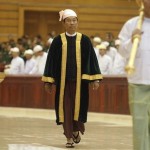 Shwe Man, Lower House parliamentary speaker, arrives at a parliament meeting room in Naypyitaw
