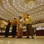 Four new lawmakers, three of whom belong to Aung San Suu Kyi’s NLD party and one representing the military, take oath at the opening of the Lower House session in Naypyitaw