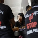 Journalists participate in a protest along the streets of Yangon