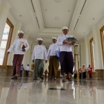 Secretary-General of Myanmar’s USDP Htay Oo walks with other members of parliament to opening of a joint parliament  session in Naypyitaw