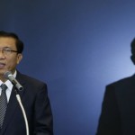 Myanmar’s Minister of Finance and Revenue Win Shein makes a speech at a meeting on Myanmar in Tokyo