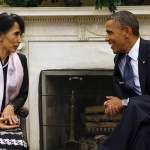 U.S. President Obama speaks with Myanmar opposition leader Suu Kyi during their meeting in the White House