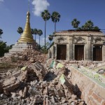 A man walks near a Buddhist pagoda that was badly damaged by an earthquake in the village of Ma Lar at Kyauk Myaung township