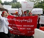 Myanmarese living in Malaysia shouts slogans during protest against Myitsone dam project, near Myanmar embassy in Kuala Lumpur