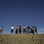 Muslims look out for possible boats bringing more refugees to their camp in Sittwe