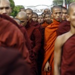 Buddhist monks take part in a protest in support of monks who were injured during a copper mine riot, in Yangon