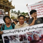 Moe Thay and Aung Soe, leaders of demonstrators peacefully protesting against the Latbadaung Mountain Copper Mine project, march near Shwedagon Pagoda
