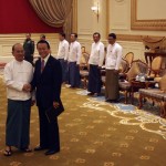 Japan’s Deputy Prime Minister and Finance Minister Taro Aso shakes hands with Myanmar’s President Thein Sein as they meet in the capital Naypyitaw