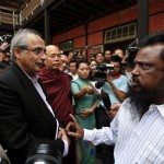 UN special Vijay Nambiar talks with a Muslim man at a refugee camp in Meikhtila