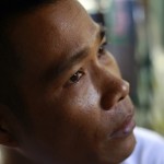 Political prisoner Min Zaw talks to reporters after his release in front of Insein prison in Yangon