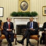U.S. President Barack Obama sits with Myanmar’s President Thein Sein in the Oval Office at the White House in Washington