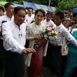 Myanmar pro-democracy leader Suu Kyi arrives at National League for Democracy party headquarters to attend her 68th birthday ceremony in Yangon