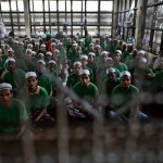 Rohingya Muslim illegal immigrants gather at the Immigration Detention Centre during Ramadan in Kanchanaburi