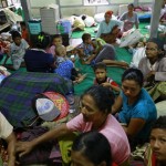 Muslims rest in a temporary refugee camp at Htan Kone village, in Myanmar’s northern Sagaing regio