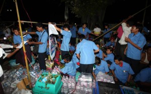 Striking workers from the Home Shin cold storage factory close down their rally site outside City Hall in Rangoon. (DVB)