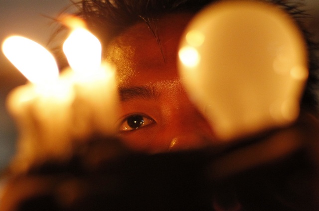 Rural Burma still lit by candles, kerosene and batteries