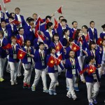 Vietnamese athletes take part in a parade during the opening ceremony of the 27th SEA Games in Naypyitaw