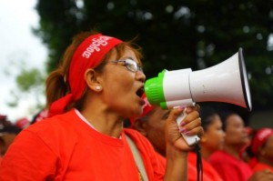 A Michaungkan villager calls for the return of land allegedly seized by the military in 1990, December 2013. (Photo: DVB)