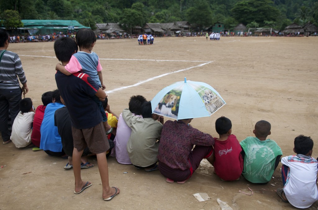 Spectators wait for the start of a football game at Mae La refugee camp. (PHOTO: Dene-Hern Chen)