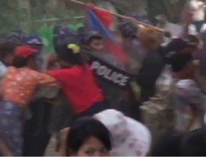 The moment police and striking workers clashed on Friday was captured by a retreating cameraman. (PHOTO: DVB)