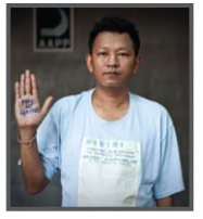 Bo Gyi, co-founder and joint secretary of the Assistance Association for Political Prisoners, seen here in the 2010  'Even though I am free  I am not' campaign (Photo: AAPP)