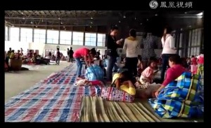 Kokang refugees arrive at the Nansan International Exhibition Center, Yunnan Province, China, after fleeing fighting in and around Laogai, northern Shan State.  