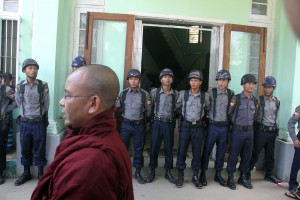 Buddhist monks patrol outside the Bahan courthouse. (PHOTO: DVB)
