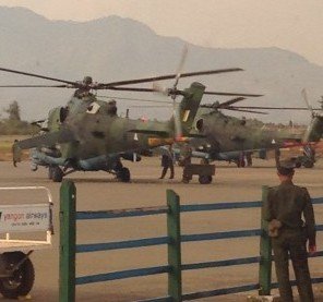 Burmese military helicopters, pictured by an independent researcher at Lashio airport on 10 February 2015. 