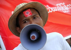Workers from the Hlaing Thayar Industrial Zone, Rangoon, march from the Bo Seinman sports grounds in Bahan Township to the public protest grounds in Tamwe. The rally was organised by the Action Labour Rights group (Photo: DVB)
