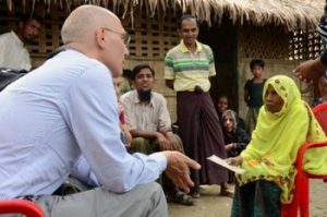 UN Assistant High Commissioner for Protection Volker Türk speaks with a woman in a Rohingya village near Maungdaw, 12 July 2015. (PHOTO: UNHCR)