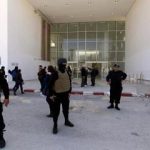 Tunisian police officers guard the entrance of the National Bardo Museum in Tunis