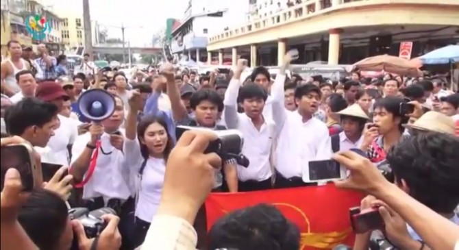 Activists rallied in downtown Rangoon on 30 June calling for the resignation of military MPs. (PHOTO: DVB TV screenshot).