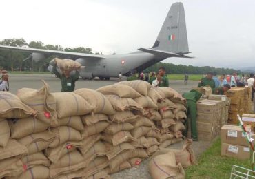 Flood aid begins arriving from India, China